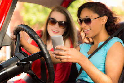 Girl Driving while on phone